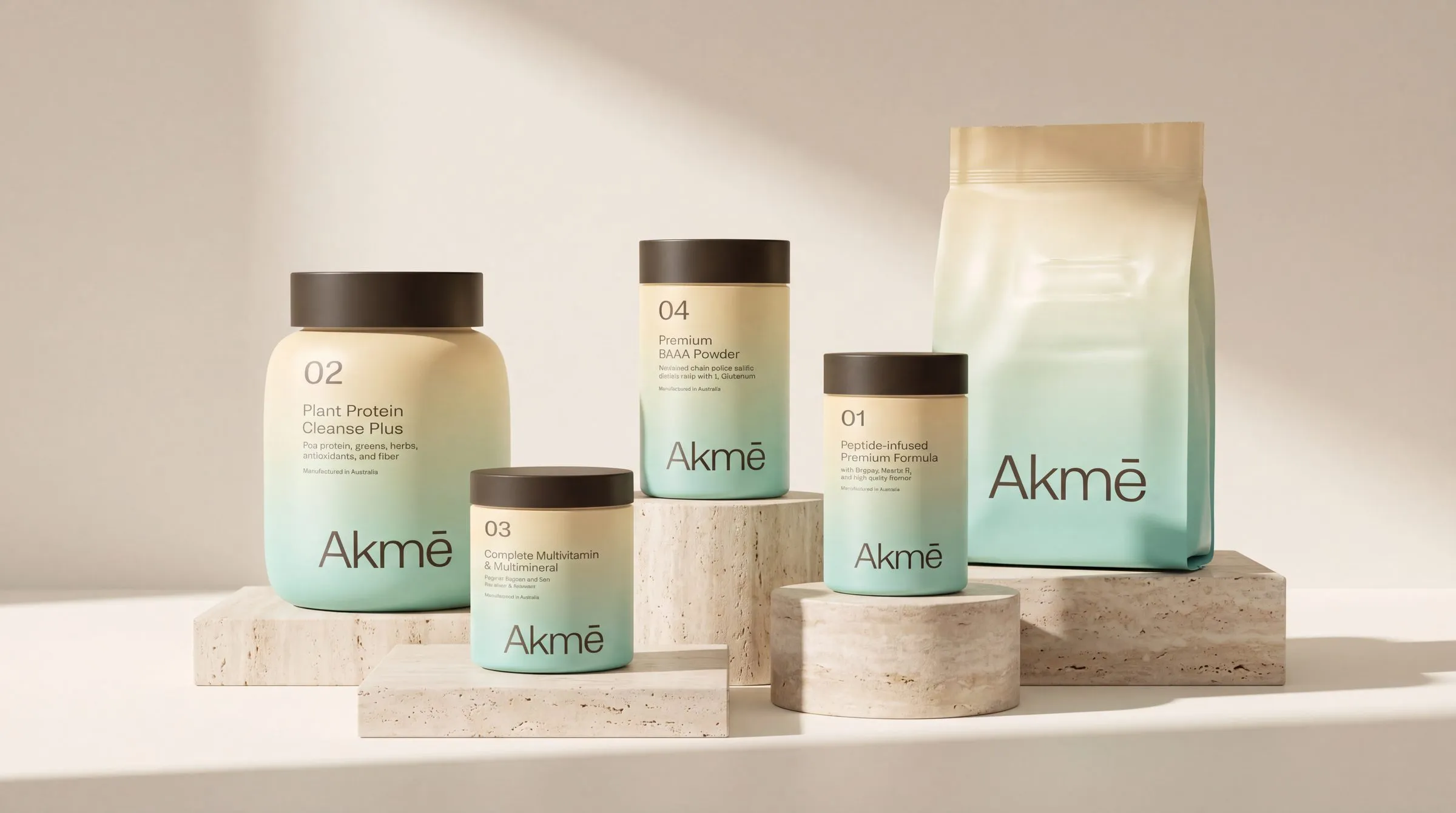 The Akmē range of five products arranged on travertine plinths in warm sunlight